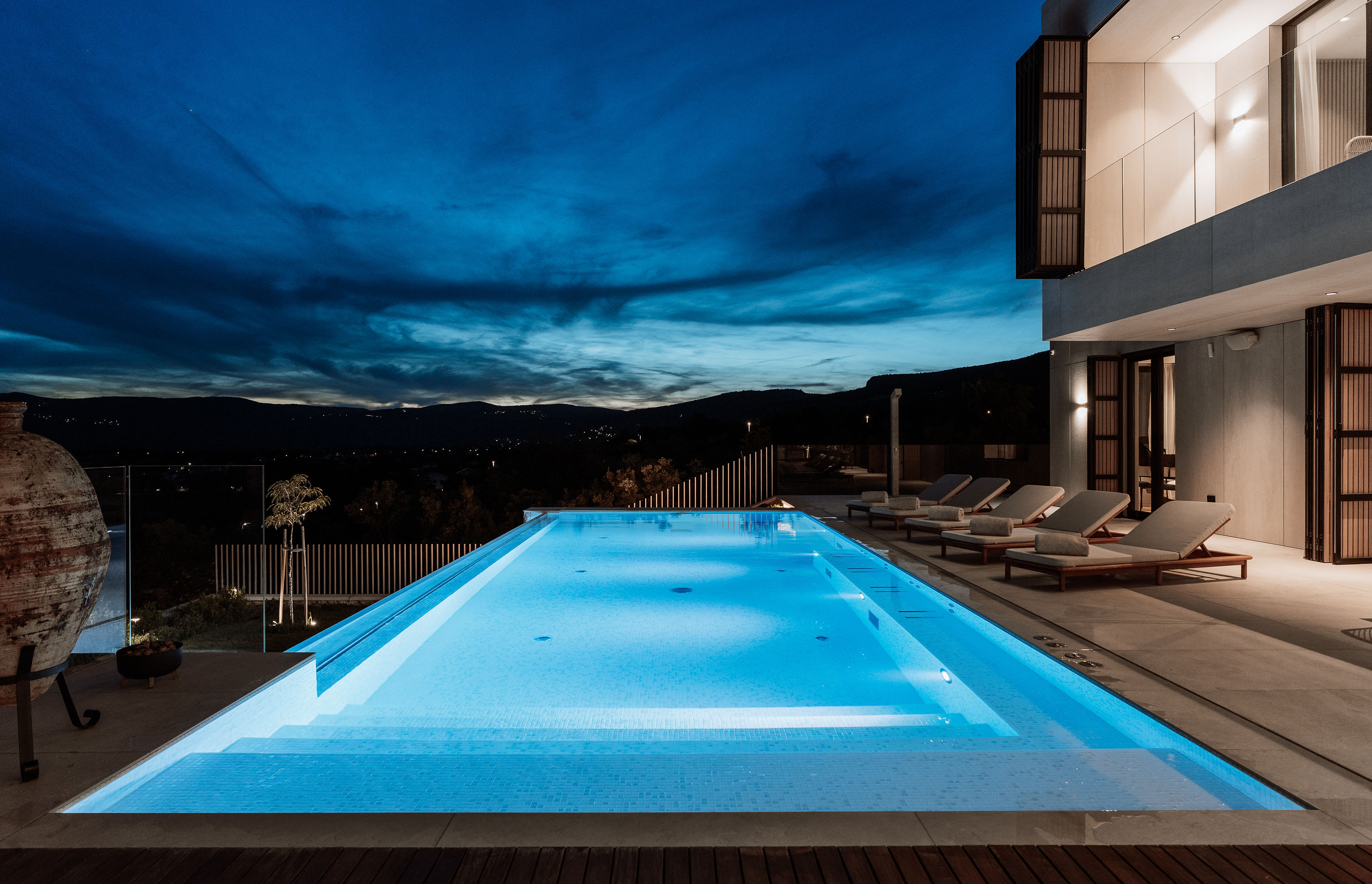 Villa Z1 — holiday home croatia night pool lit facade